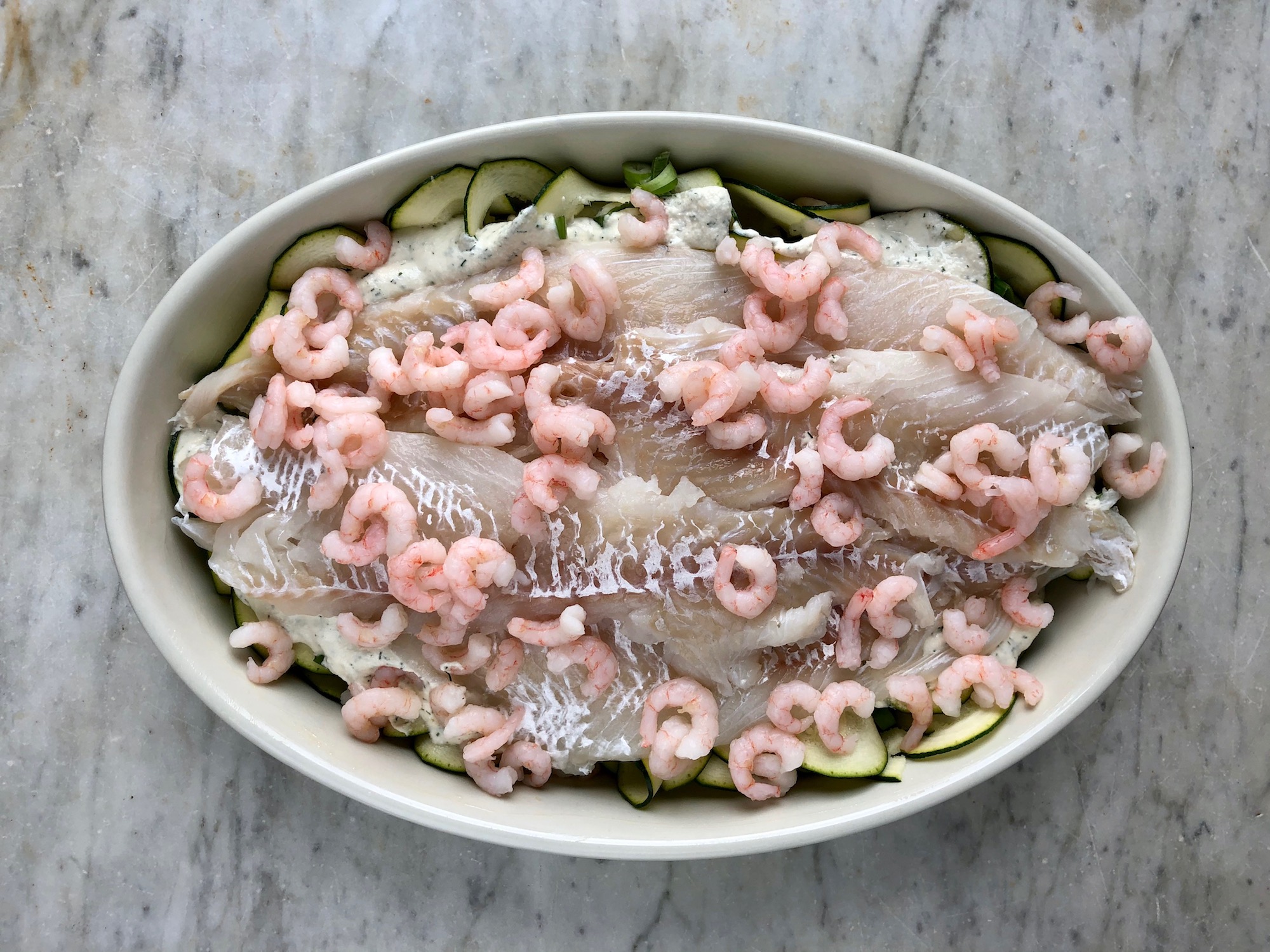 Fisk och räkor i gratängform